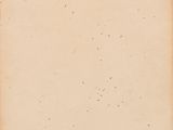 an old piece of paper with a small hole in the middle of it