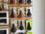 a wall with many different types of shoes on it