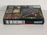 an image of a box of the untouchables game on a table
