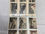 an old photo album with a lot of old photos in it