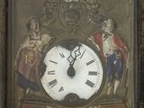 l'image d'une horloge accrochée au mur