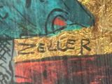 a close up of a painting of a dog with a sign on it