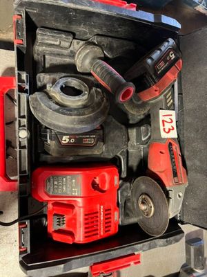a tool box with tools in it on a table