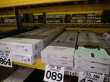 many boxes that are on a shelf in a store
