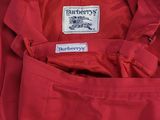 a close up of a red jacket with a label on it