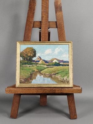 une peinture à l'huile représentant une scène de vie à la ferme, posée sur un chevalet près d'une rivière
