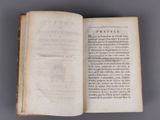 an open book with a black and white image on it