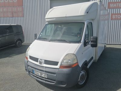 a white van parked in front of a building