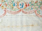 an old manuscript with a bird and flowers design on it
