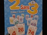 a card game in a tin with numbers on it