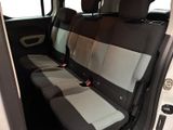 a car that has two seats in the back