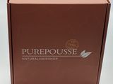 a brown box with a logo on it sitting on a white surface