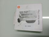 a white box with a barcode on it sitting on a table