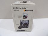 a box with a camera inside of it on a table
