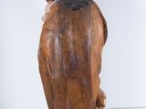statue of a man with a bird on his shoulder