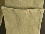 a close up of a pair of pants hanging on a clothes rack