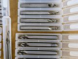 a lot of different tools in a box on the table