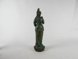 a small bronze statue of a woman with a hat on her head