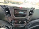 a dashboard of a car with a radio and a steering wheel