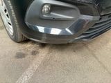 a close up of the front bumper of a car
