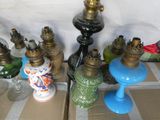 many different types of glass vases on the table