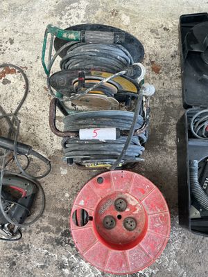 a lot of tools that are laying out on the floor