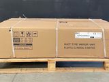 a large cardboard box on a pallet on the ground