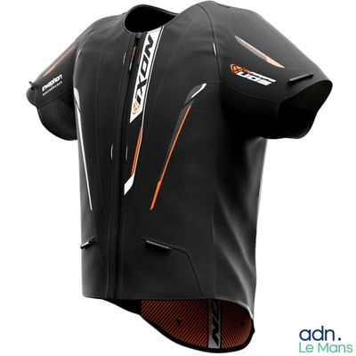 a close up of the back of a black and orange motorcycle jacket