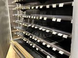 many empty shelves in a store with a lot of empty items