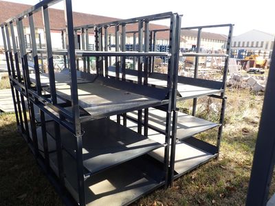 many shelves that are on the ground in the yard
