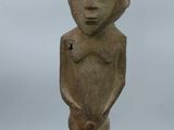 an image of a statue of a person with a helmet on