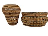 two baskets with handles and handles are sitting next to each other