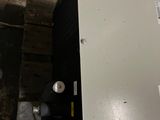 an image of a refrigerator in a room that is under construction