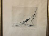 a black and white drawing of a mountain in a gold frame