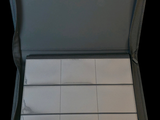 an open suitcase with a lot of papers inside of it