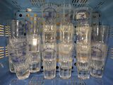 many glasses in the microwave on the shelf