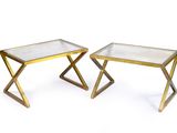 pair of brass side tables with glass tops