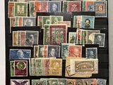 a picture of a collection of stamps in a display case