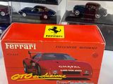 a display case with several different model cars in it