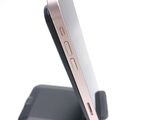 a close up of a cell phone on a stand