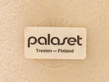 the label on the back of a piece of fabric that says palanet