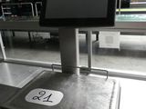 une photo d'une caisse enregistreuse dans une épicerie