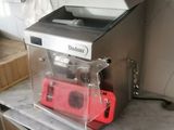 a counter top with a blender on it in a kitchen