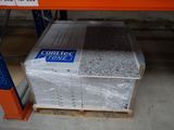 a stack of boxes sitting on a pallet in a warehouse