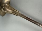 a spoon that has a long handle on it