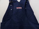 a close up of a pair of overalls on a white surface