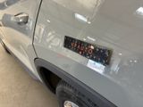 a close up of a car with a sticker on it