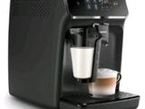 an image of a coffee machine with milk in it on a white background