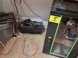a small refrigerator with a soda can in it on the floor