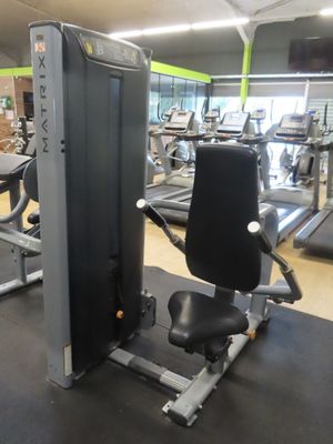 an image of a gym room with machines and other equipment